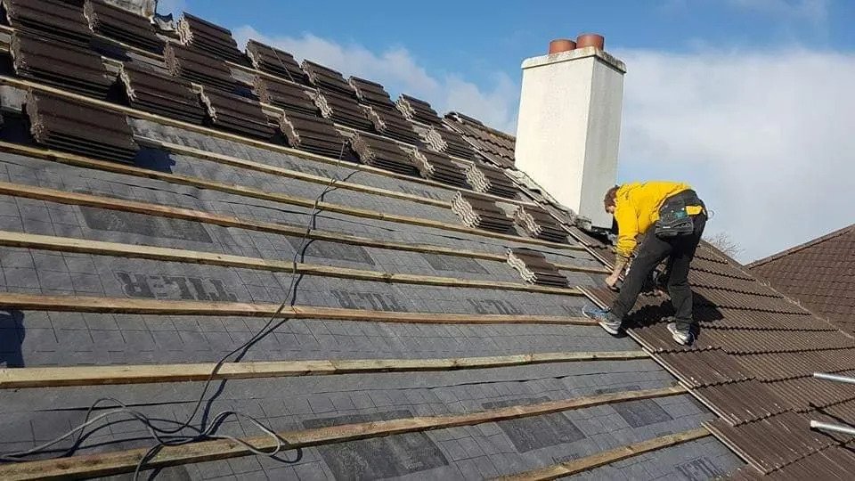 man-fixing-roof